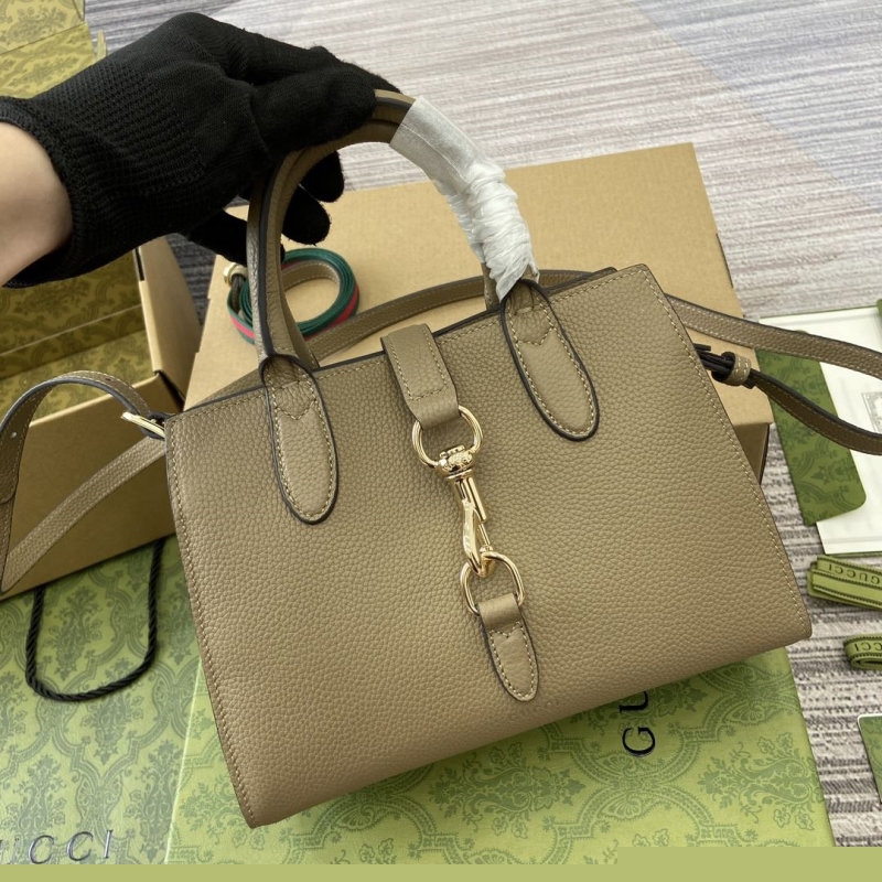 G*u*i top handle bags